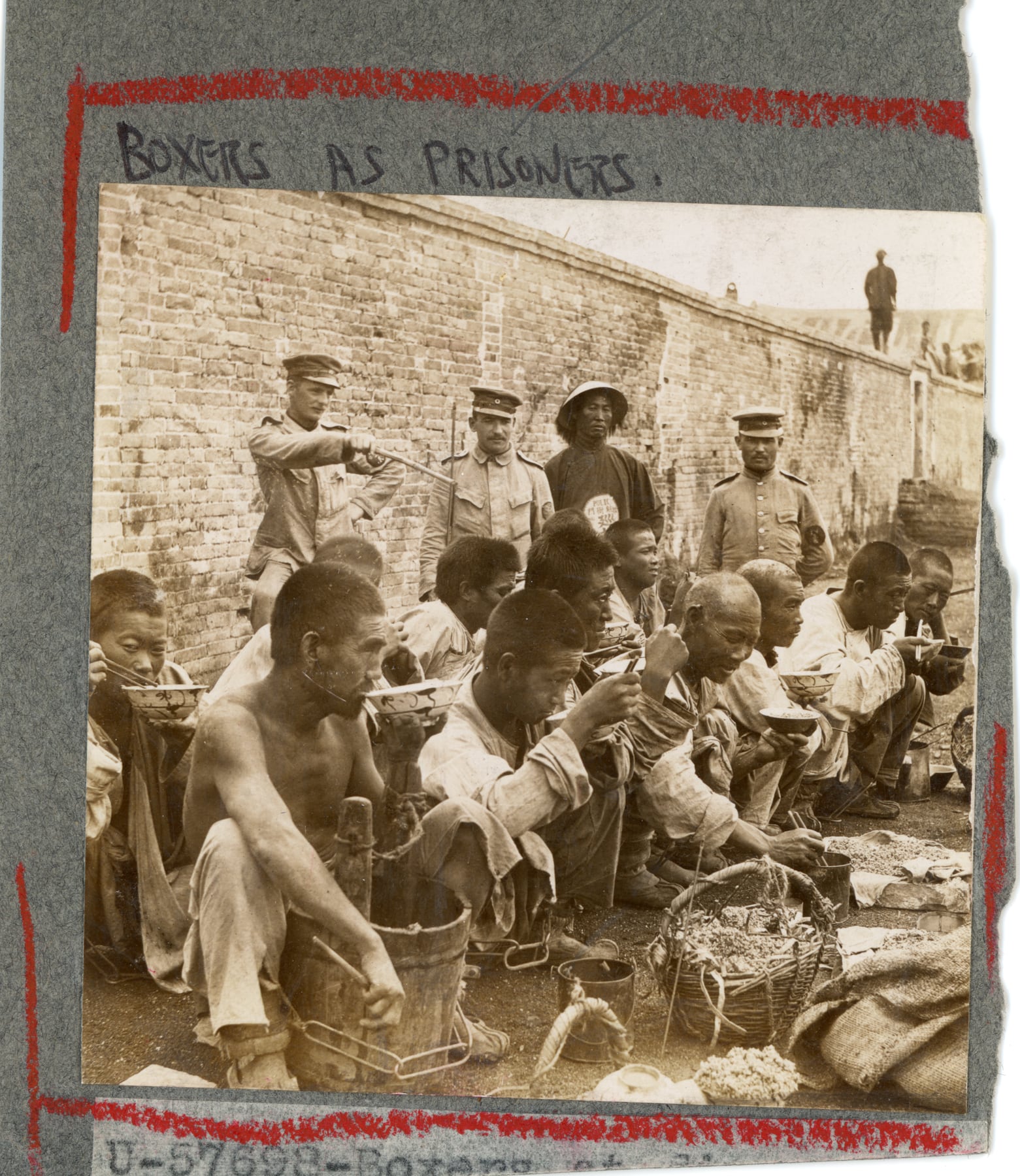 Historical photograph of Boxer prisoners.