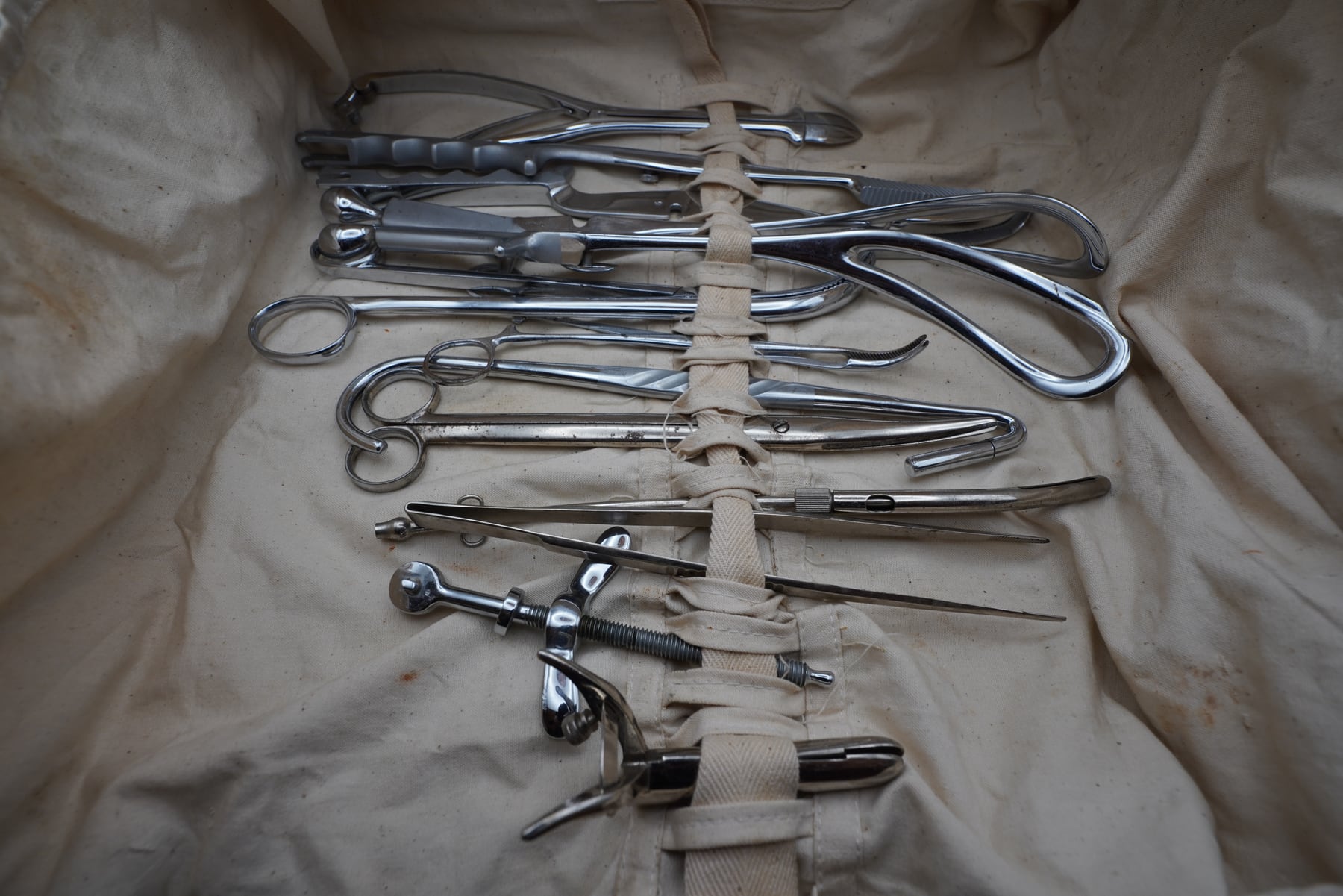 A roll of historical medical instruments.